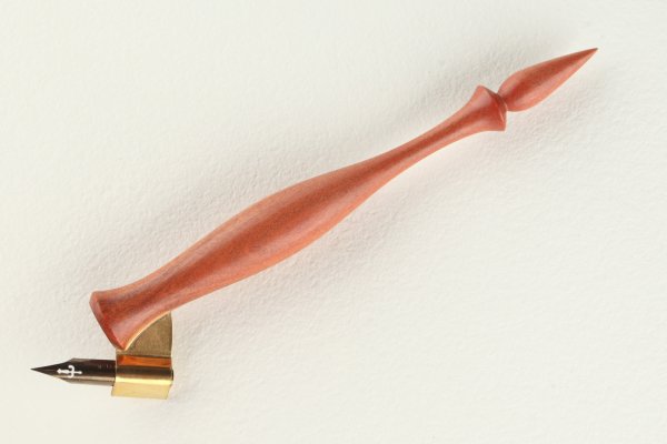 Oblique pen holder made of Pink Ivory wood.