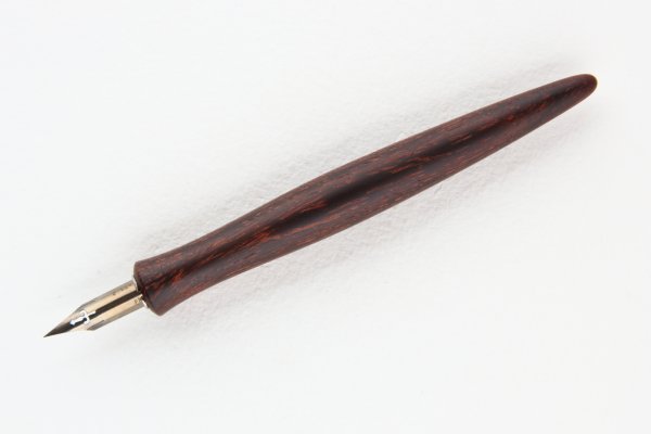 Straight pen holder made of Camel Thorn wood.